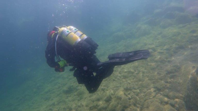 Twin set diver doing dive leader training
